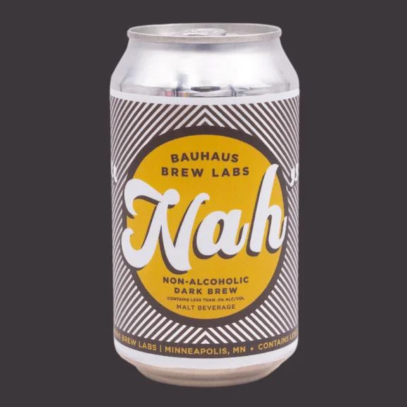 Nah Dark Brew, a non-alcoholic dark lager with a rich malt base, presented against a plain background.