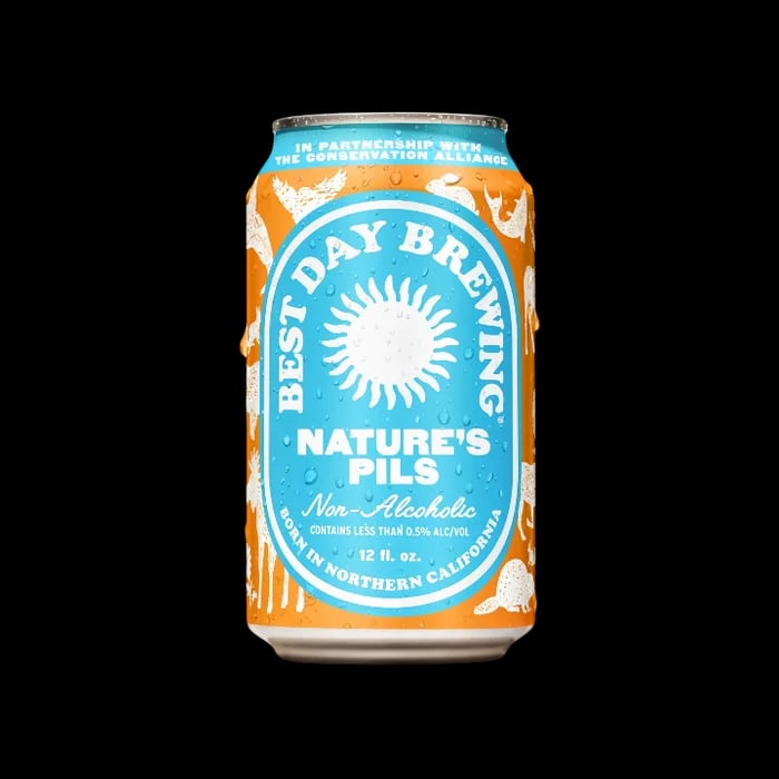 Nature's Pils by Best Day Brewing featuring a crisp, citrusy, woody non-alcoholic pilsner with balanced malt and low calories on plain background