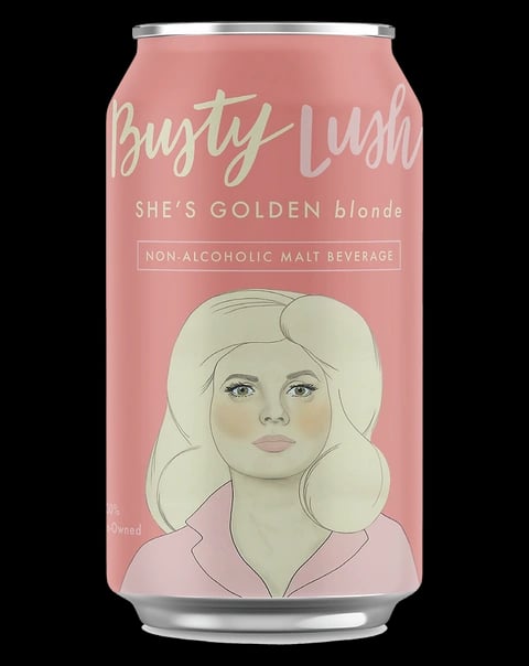 Busty Lush She's Golden Blonde non-alcoholic beer featuring tropical fruit hints and a clean dry finish in a sleek, modern design