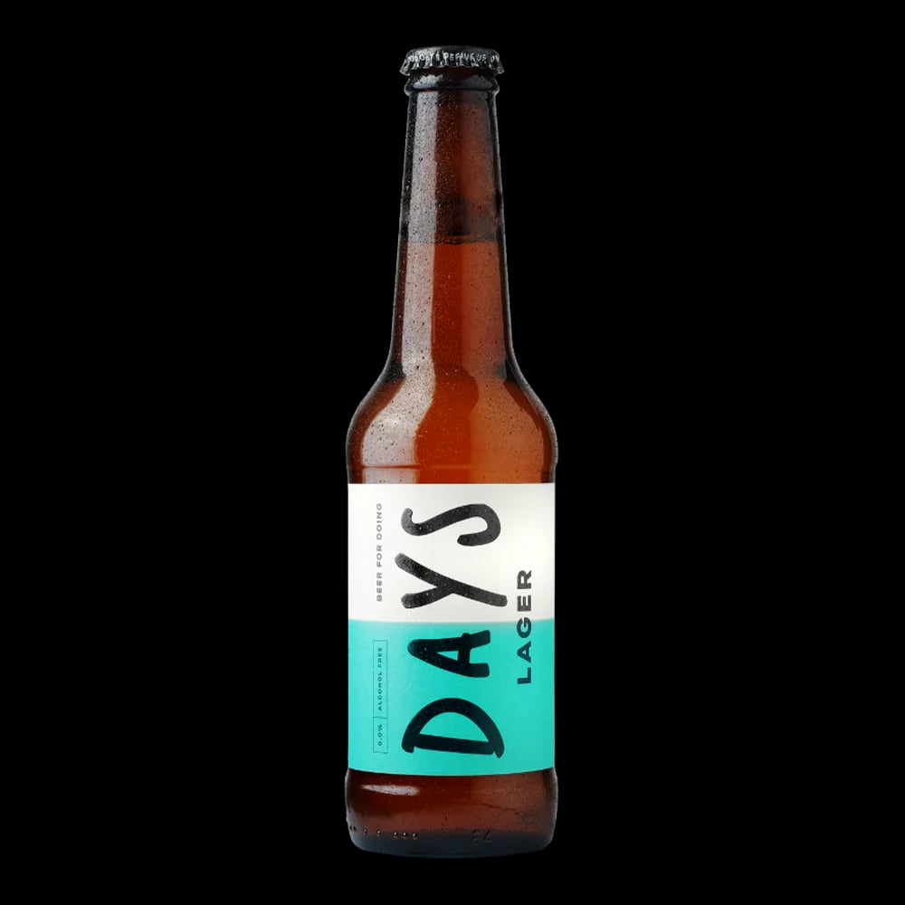 Days Brewing Alcohol Free Lager featuring a crisp amber color with floral hop aromas and balanced malt character, perfect zero-alcohol beer.
