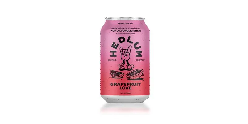 Refreshing Hedlum Grapefruit Love non-alcoholic beer with bright grapefruit notes and crisp golden wheat style against a plain background.