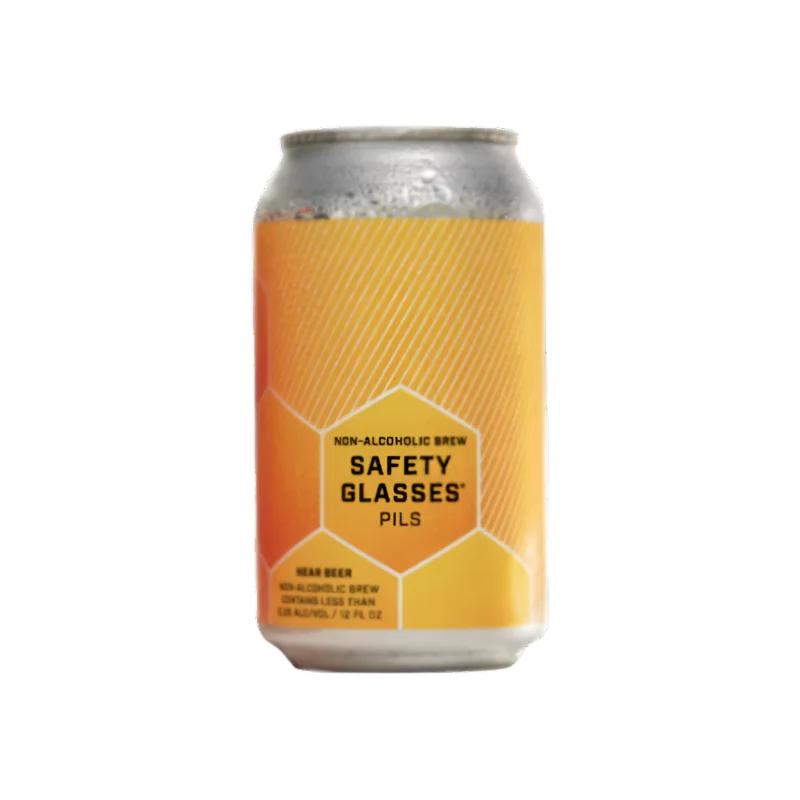 Industrial Arts Safety Glasses Pilsner non-alcoholic beer featuring a crisp, full-flavored pilsner style with below 0.5 percent alcohol