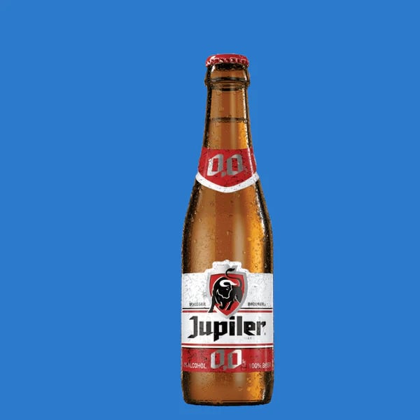 Jupiler 0.0 non-alcoholic beer showcasing the crisp, golden pilsner with balanced malt, hops and refreshing zero-alcohol flavor