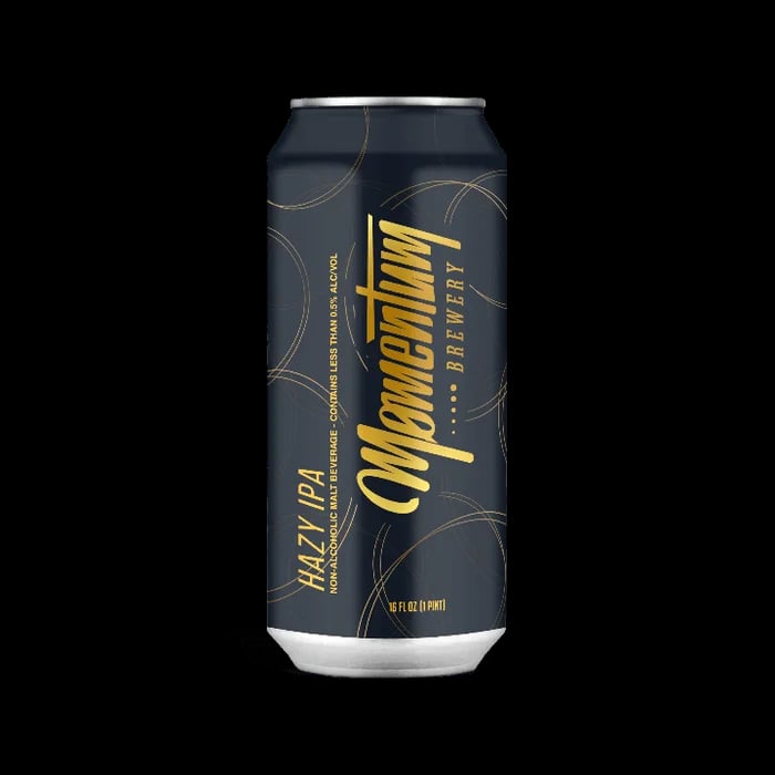 Momentum Brewery Hazy IPA non-alcoholic beer featuring a golden amber hue with tropical, citrus, and pine hop notes that refresh the senses.