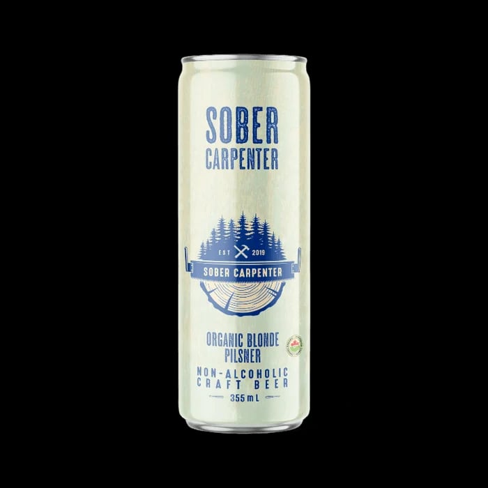 Sober Carpenter Organic Blonde Pilsner non-alcoholic beer with crisp, balanced flavor and subtle hop bitterness against a plain background